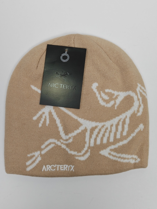 Arc'teryx Other - Arc'teryx Tan And White Bird Head Toque Skullcap Beanie
